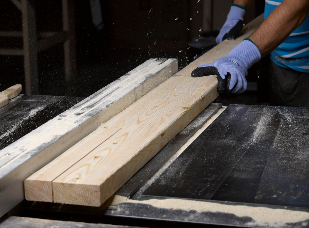 Wood being cut during furniture manufacturing